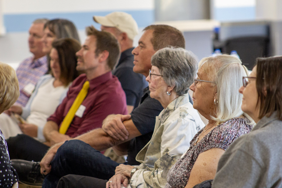 Group watching presenter